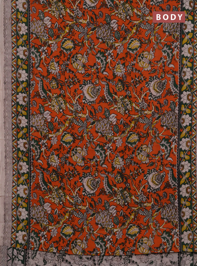 Kalamkari semi silk saree orange and green with allover prints and printed border