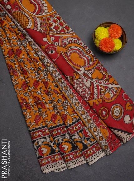 Kalamkari semi silk saree mustard yellow and black with allover prints and printed border