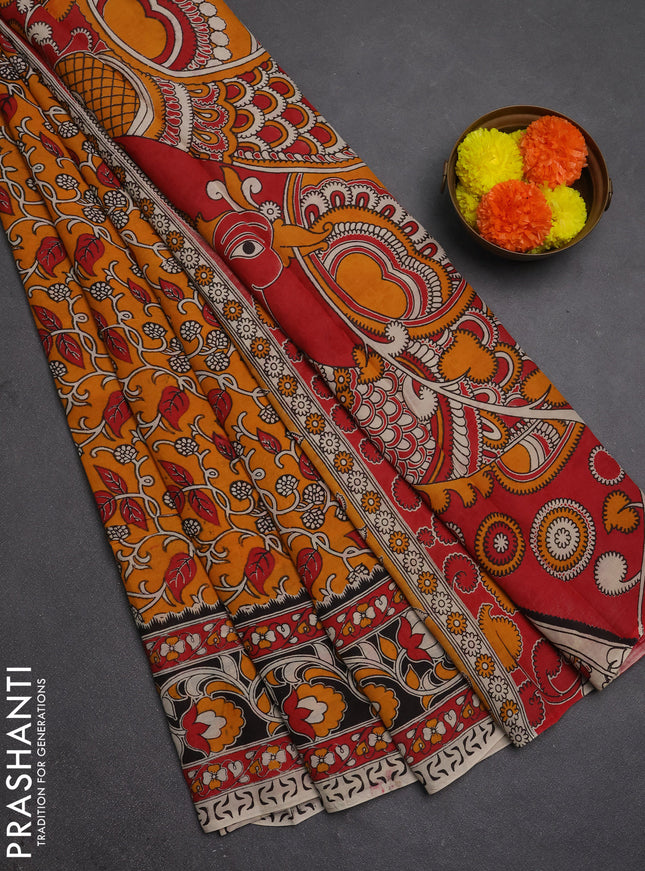 Kalamkari semi silk saree mustard yellow and black with allover prints and printed border