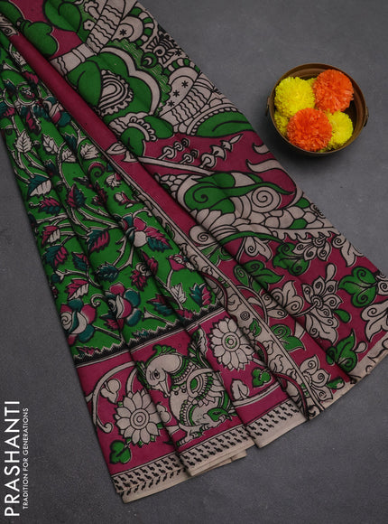 Kalamkari semi silk saree light green and pink with allover prints and printed border