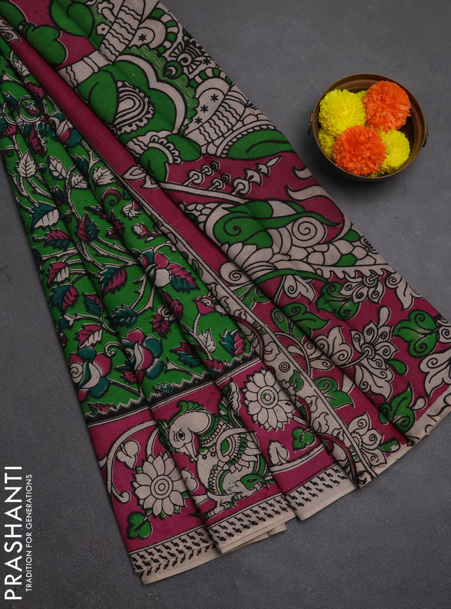 Kalamkari semi silk saree light green and pink with allover prints and printed border