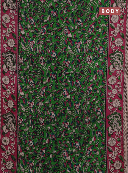 Kalamkari semi silk saree light green and pink with allover prints and printed border