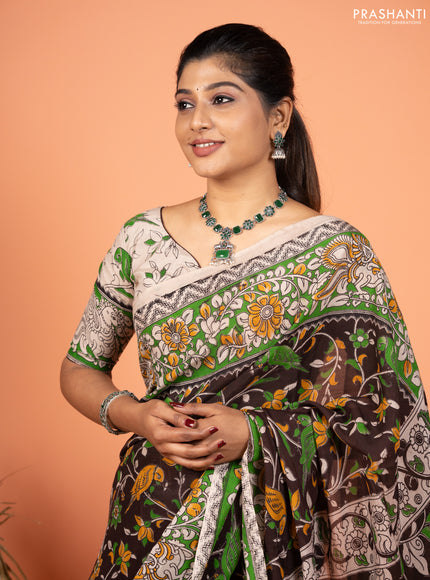 Kalamkari semi silk saree coffee brown and light green with allover prints and mangalgiri border