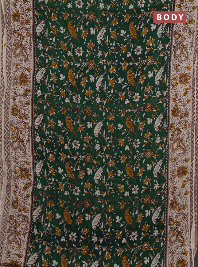 Kalamkari semi silk saree green and beige with allover prints and printed border