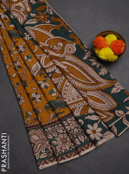 Kalamkari semi silk saree mustard yellow and gree shade with allover prints and printed border