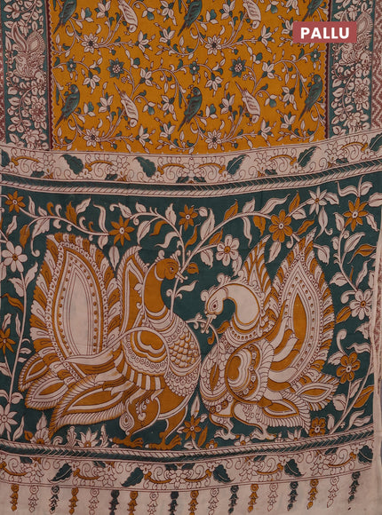 Kalamkari semi silk saree mustard yellow and gree shade with allover prints and printed border