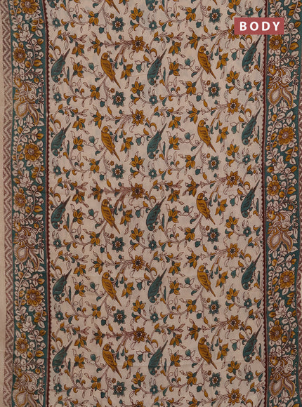 Kalamkari semi silk saree beige and gree shade with allover prints and printed border
