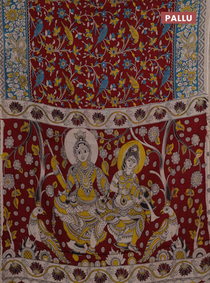 Kalamkari semi silk saree maroon and blue with allover prints and printed border