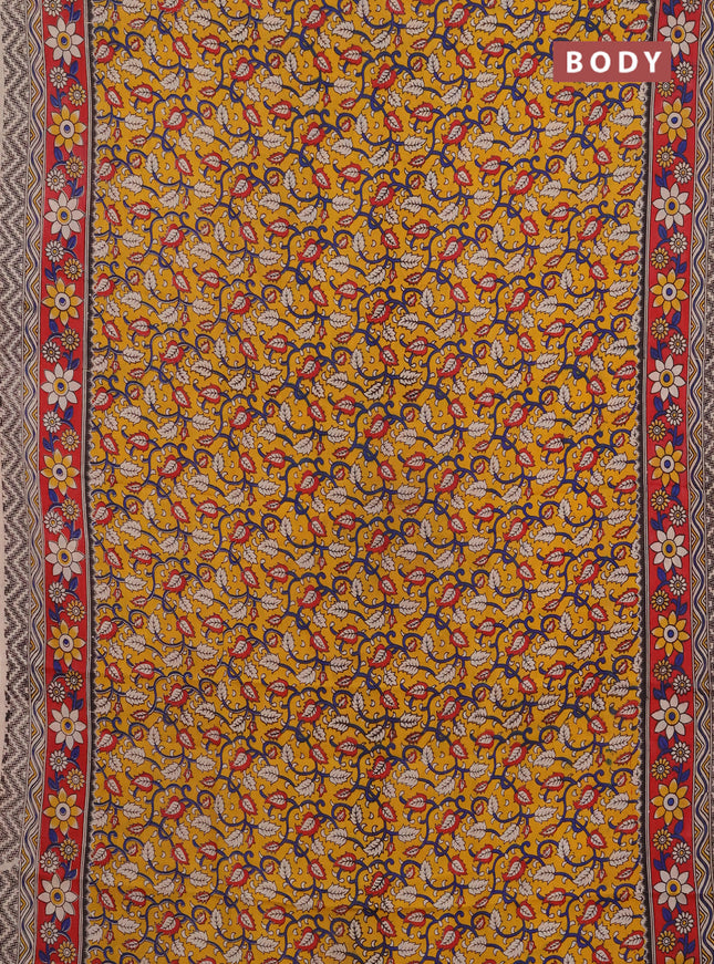 Kalamkari semi silk saree mustard yellow and red with allover prints and printed border