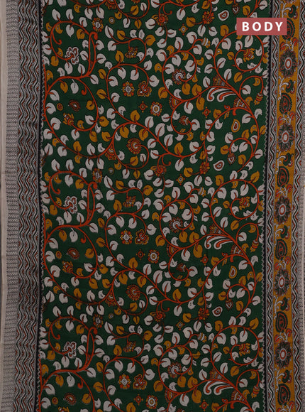 Kalamkari semi silk saree bottle green and mustard yellow with allover prints and printed border