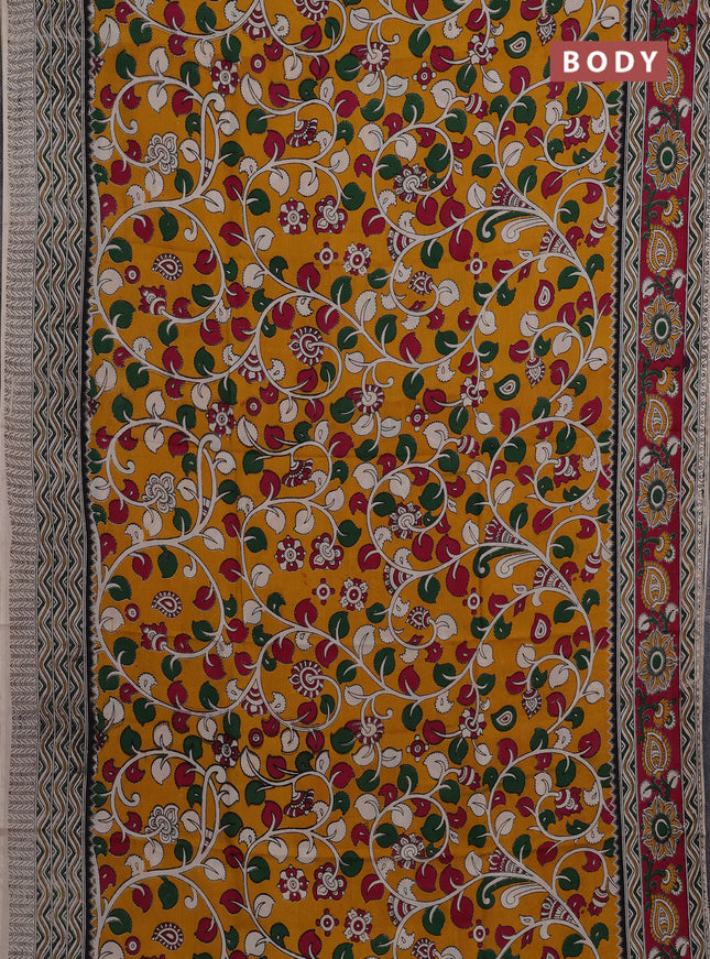 Kalamkari semi silk saree mustard yellow and magenta pink with allover prints and printed border