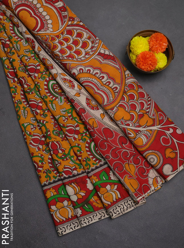 Kalamkari semi silk saree mustard yellow and red with allover prints and printed border