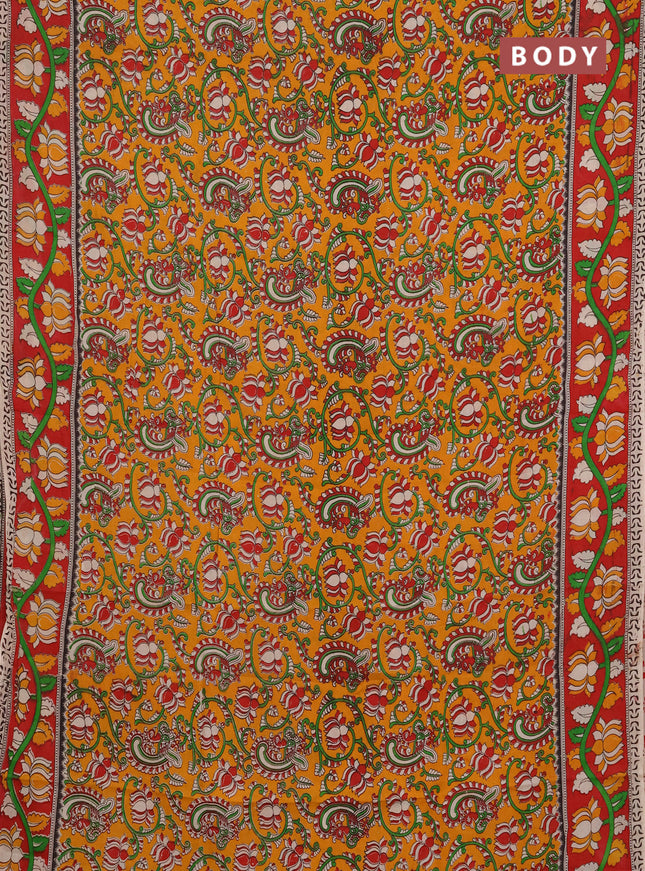 Kalamkari semi silk saree mustard yellow and red with allover prints and printed border