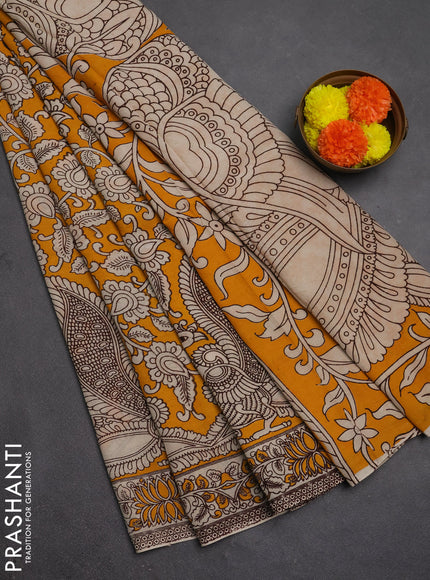 Kalamkari semi silk saree mustard yellow and beige with allover prints and printed border