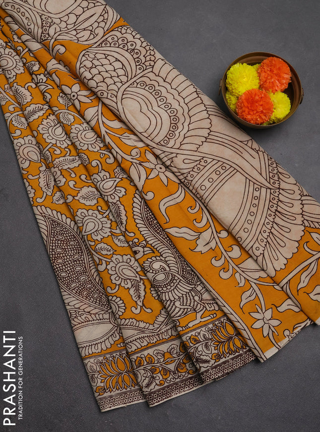 Kalamkari semi silk saree mustard yellow and beige with allover prints and printed border