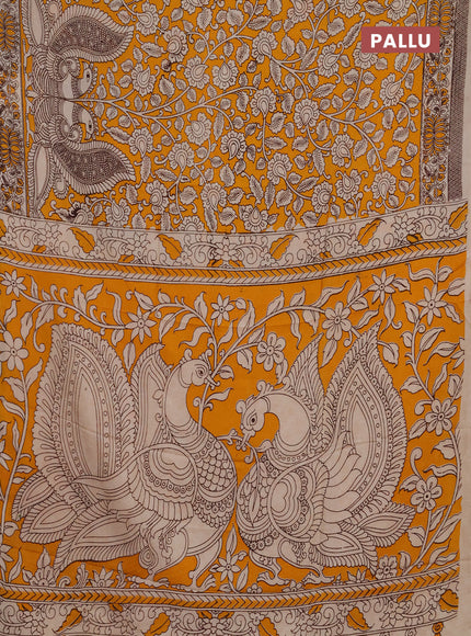 Kalamkari semi silk saree mustard yellow and beige with allover prints and printed border