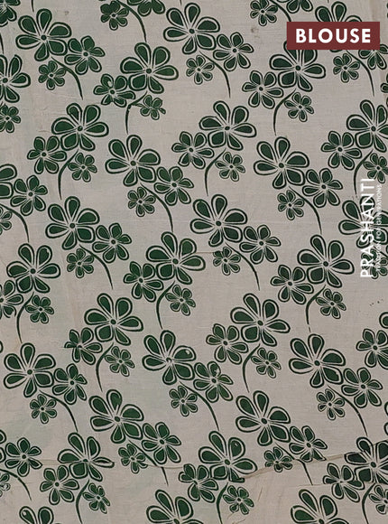 Kalamkari semi silk saree beige and light green with allover prints and printed border