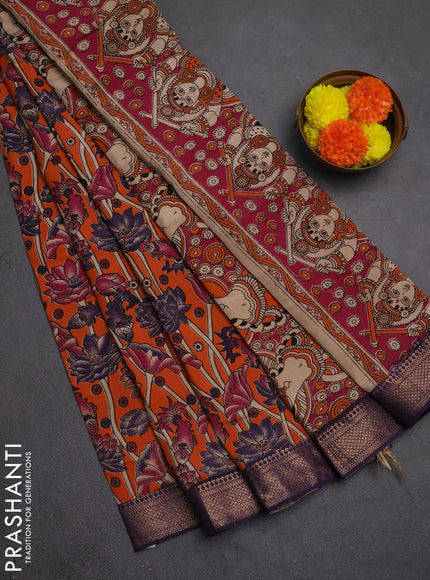 Kalamkari semi silk saree orange and violet with allover prints and mangalgiri border