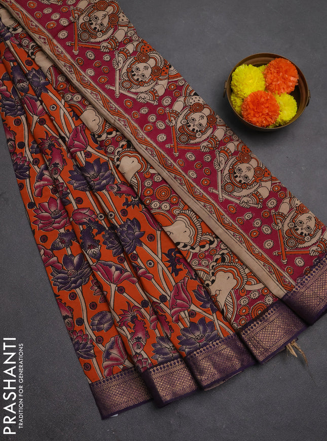 Kalamkari semi silk saree orange and violet with allover prints and mangalgiri border