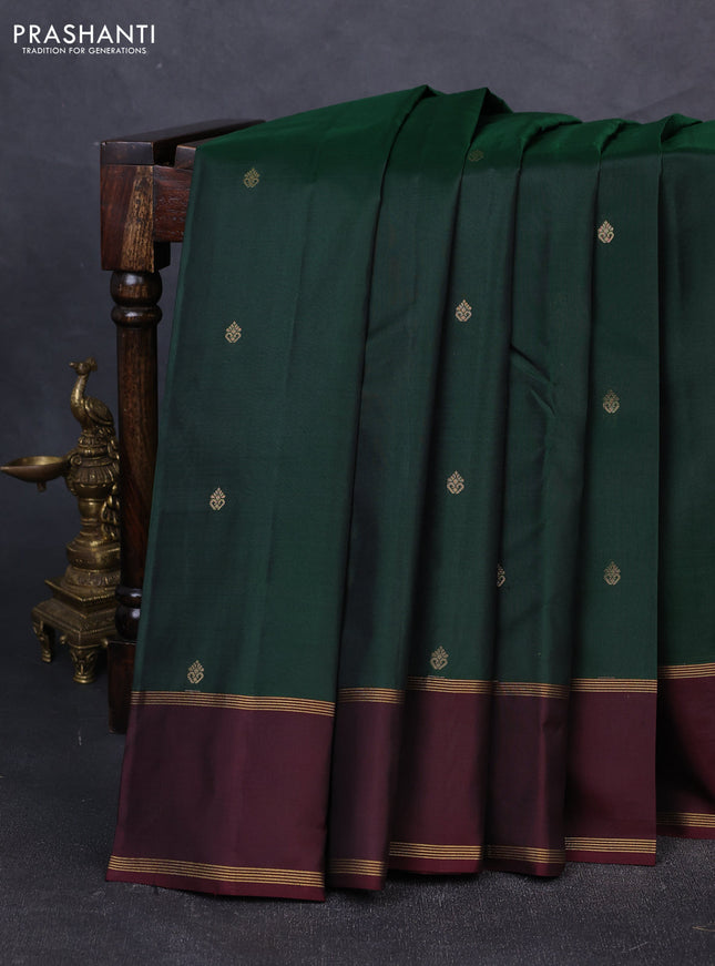 Pure kanchipuram silk saree bottle green and deep maroon with zari woven buttas and rettapet zari woven korvai border
