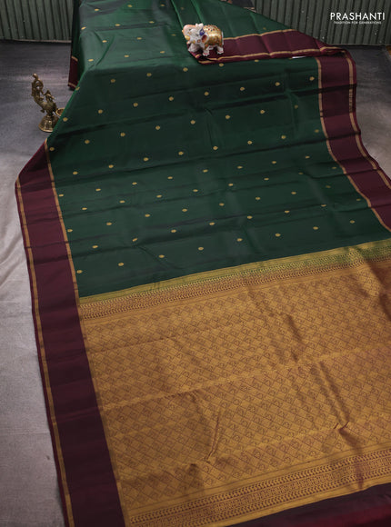 Pure kanchipuram silk saree bottle green and deep maroon with zari woven buttas and rettapet zari woven korvai border