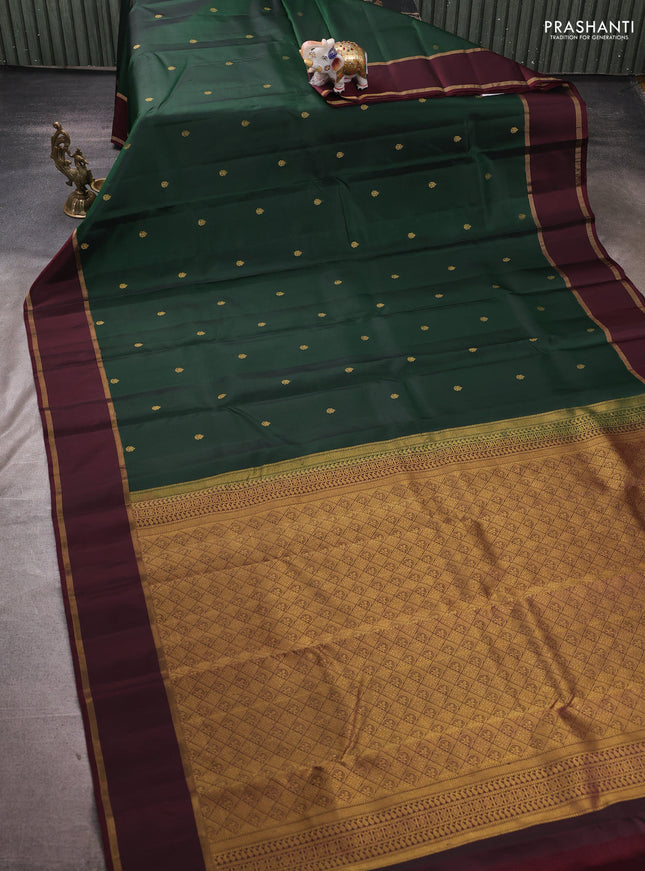 Pure kanchipuram silk saree bottle green and deep maroon with zari woven buttas and rettapet zari woven korvai border