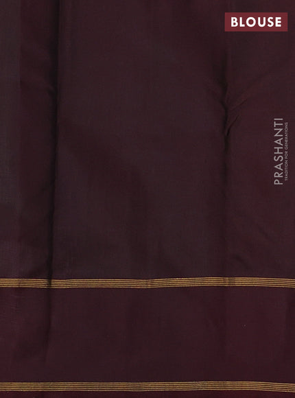 Pure kanchipuram silk saree bottle green and deep maroon with zari woven buttas and rettapet zari woven korvai border