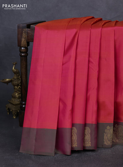 Pure kanchipuram silk saree dual shade of pinkish orange and dual shade of green with plain body and zari woven butta border