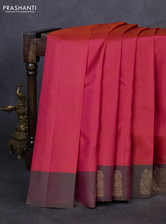 Pure kanchipuram silk saree dual shade of pinkish orange and dual shade of green with plain body and zari woven butta border