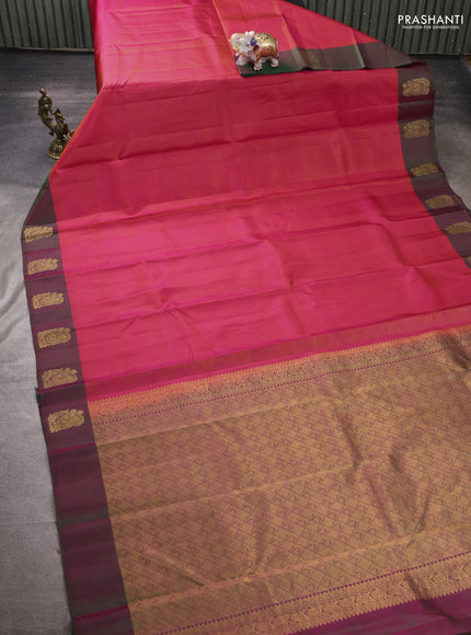 Pure kanchipuram silk saree dual shade of pinkish orange and dual shade of green with plain body and zari woven butta border