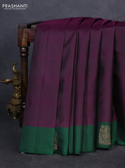 Pure kanchipuram silk saree deep purple and bottle green with plain body and zari woven butta border