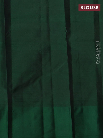 Pure kanchipuram silk saree deep purple and bottle green with plain body and zari woven butta border
