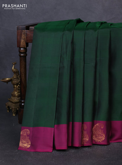 Pure kanchipuram silk saree bottle green and purple with plain body and zari woven butta border
