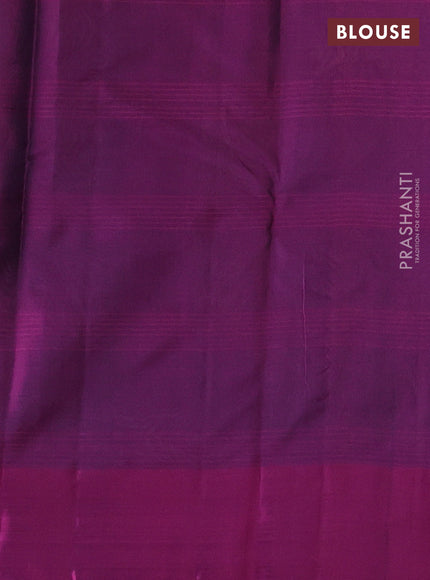 Pure kanchipuram silk saree dual shade of greenish violet and purple with plain body and zari woven butta border