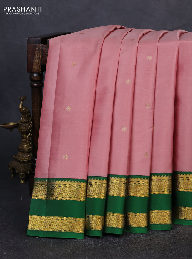 Pure kanchipuram silk saree pastel peach and green with zari woven buttas and rettapet zari woven korvai border