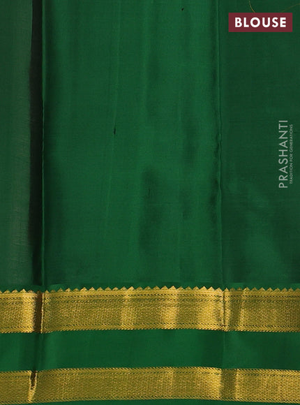 Pure kanchipuram silk saree pastel peach and green with zari woven buttas and rettapet zari woven korvai border