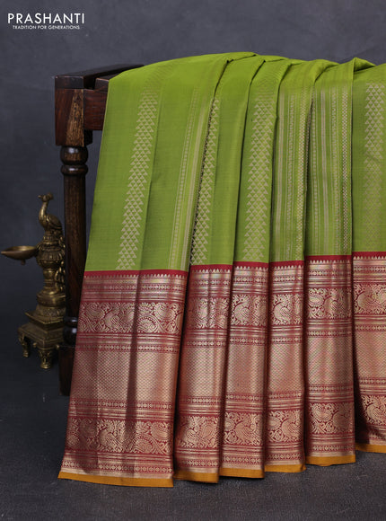 Pure kanchipuram silk saree green and maroon with allover zari weaves and long rich zari woven border