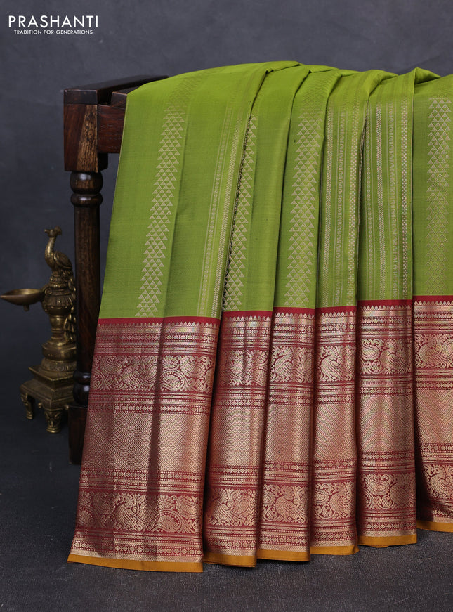 Pure kanchipuram silk saree green and maroon with allover zari weaves and long rich zari woven border