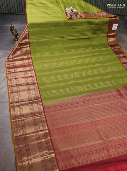 Pure kanchipuram silk saree green and maroon with allover zari weaves and long rich zari woven border