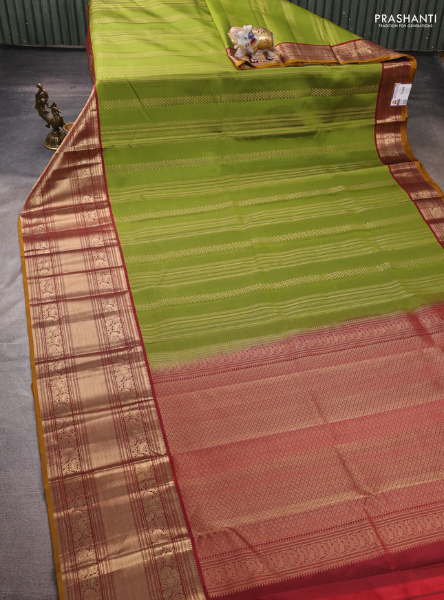Pure kanchipuram silk saree green and maroon with allover zari weaves and long rich zari woven border
