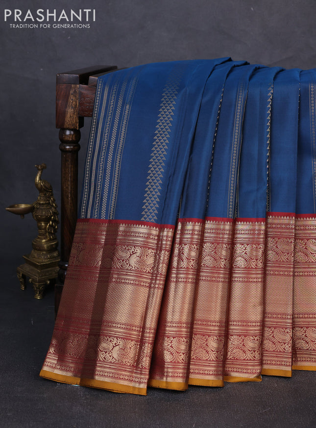 Pure kanchipuram silk saree peacock blue and maroon with allover zari weaves and long rich zari woven border