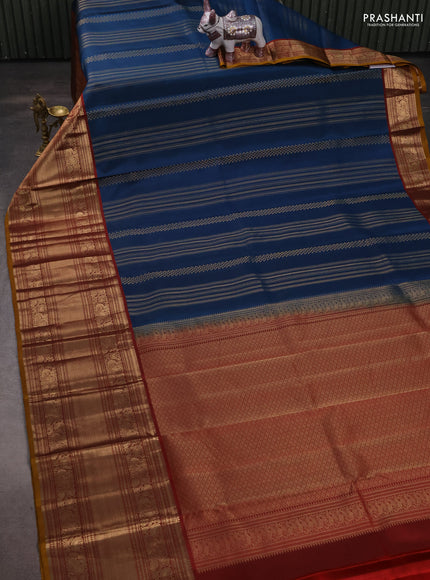 Pure kanchipuram silk saree peacock blue and maroon with allover zari weaves and long rich zari woven border