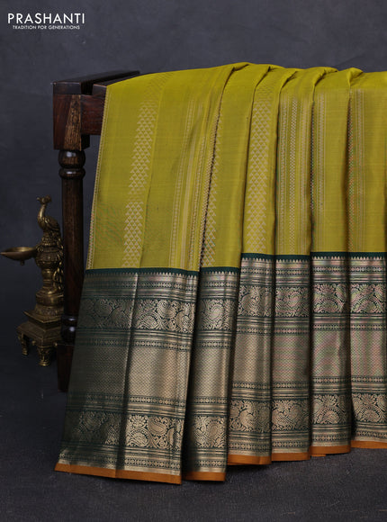 Pure kanchipuram silk saree mehendi green and bottle green with allover zari weaves and long rich zari woven border