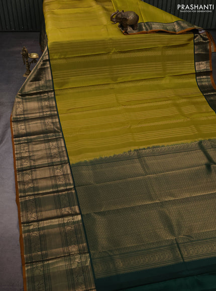 Pure kanchipuram silk saree mehendi green and bottle green with allover zari weaves and long rich zari woven border