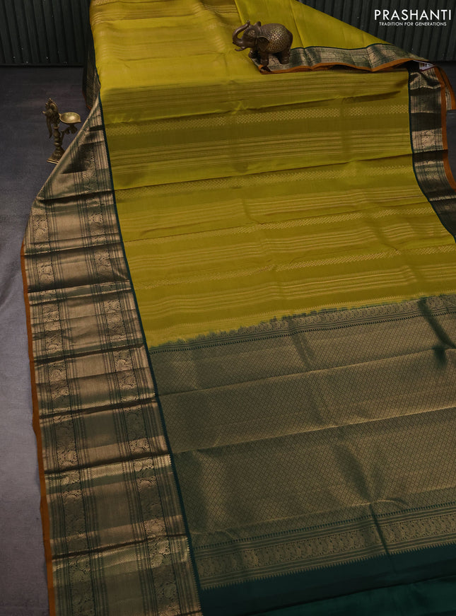 Pure kanchipuram silk saree mehendi green and bottle green with allover zari weaves and long rich zari woven border