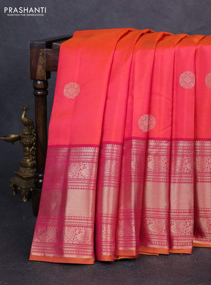 Pure kanchipuram silk saree dual shade of pinkish orange and dark pink with zari woven buttas and long zari woven border
