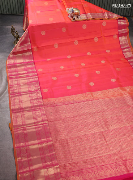 Pure kanchipuram silk saree dual shade of pinkish orange and dark pink with zari woven buttas and long zari woven border