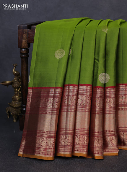 Pure kanchipuram silk saree mehendi green and maroon with zari woven buttas and long zari woven border