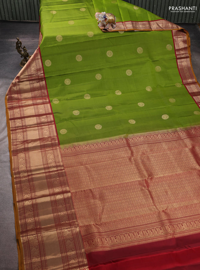 Pure kanchipuram silk saree mehendi green and maroon with zari woven buttas and long zari woven border
