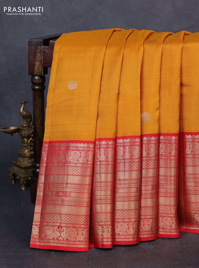Pure kanchipuram silk saree mustard yellow and red with zari woven buttas and long zari woven korvai border